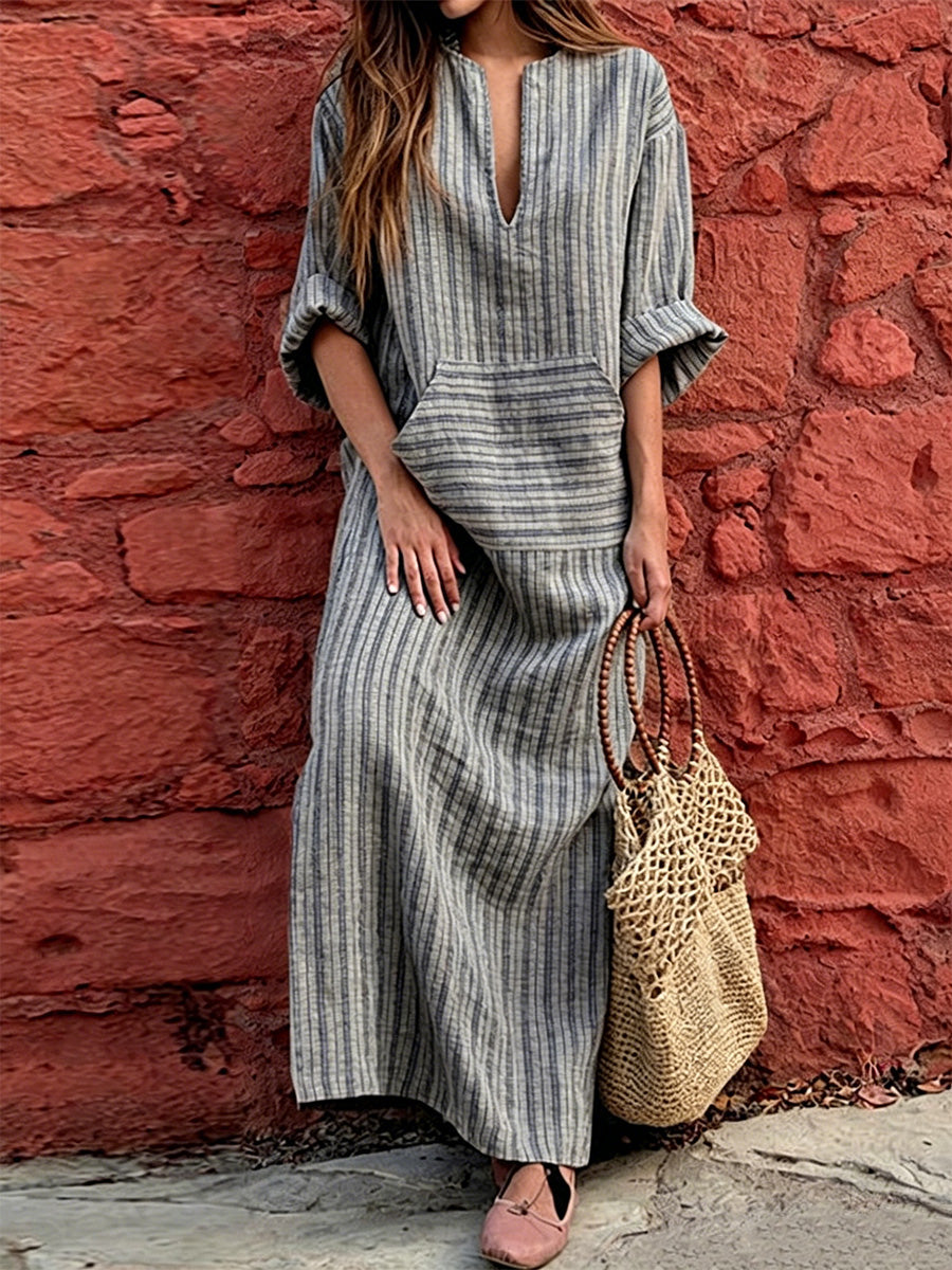 Vintage Resort-style Linen Dress Featuring A Washed, Textured Finish And Fine Pinstripes. Designed With A Semi-open V-neck, Dropped Shoulders, Roll-up Sleeves, And Large Pockets, It Offers A Flattering, Figure-concealing Fit