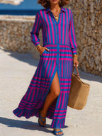 Women's Vibrant pink & blue vertical stripe shirt dress with collared neck and full button front. Elastic waist tiered ruffle skirt, front slit and side pockets. Light flowy fabric, eye-catching resort wear for beach and summer daily outfits.