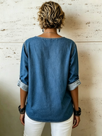 Relaxed-fit, Distressed Soft Denim Shirt Featuring A Crew Neck, Rolled Sleeves, Side Metal Buckles, Side Slits, And An Asymmetrical Hem