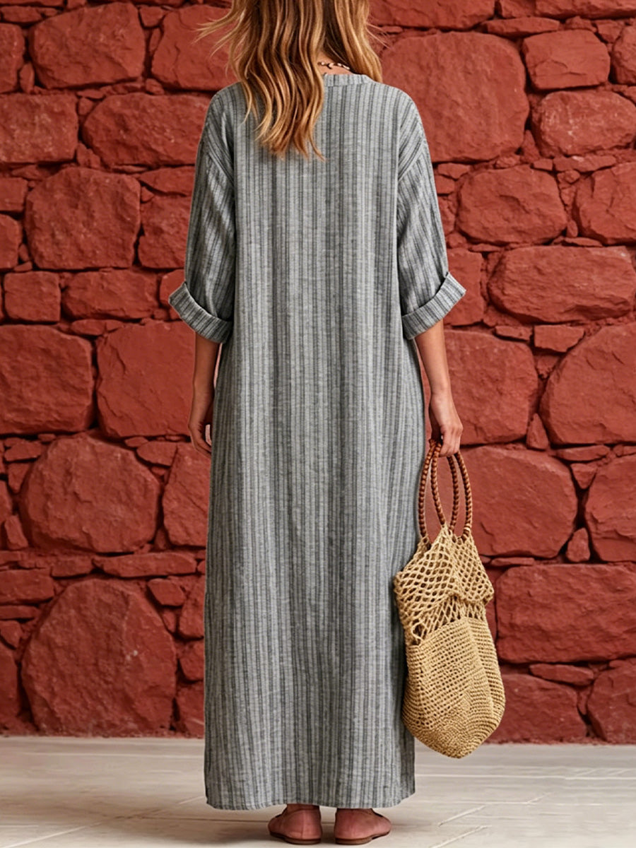 Vintage Resort-style Linen Dress Featuring A Washed, Textured Finish And Fine Pinstripes. Designed With A Semi-open V-neck, Dropped Shoulders, Roll-up Sleeves, And Large Pockets, It Offers A Flattering, Figure-concealing Fit