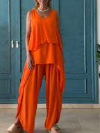 Casual Two-piece Set Featuring A Sleeveless Drop-shoulder Top And Trousers.