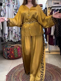 Loose And Comfortable Two-piece Set Featuring A Lightweight Satin Shirt And Trousers With Leopard-print Panels.